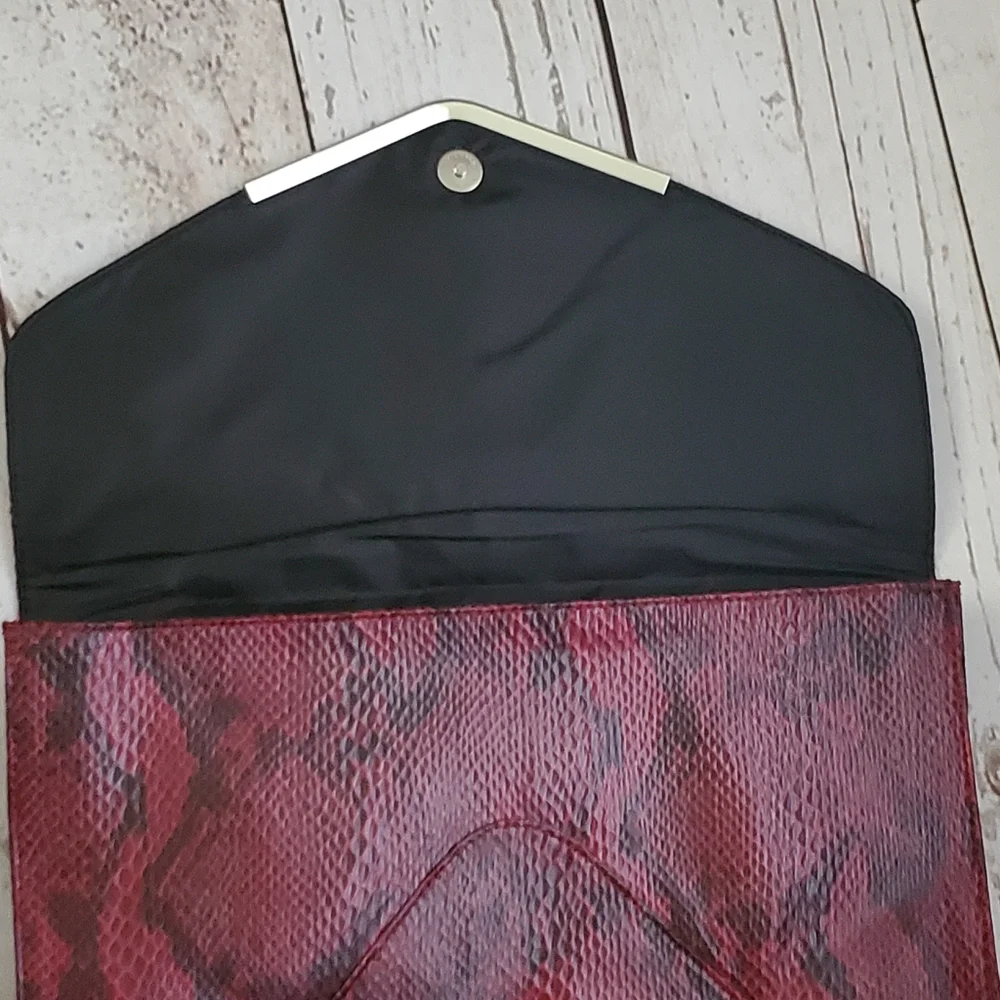 Mossimo women's vinyl envelope clutch burgundy, black snakeskin print